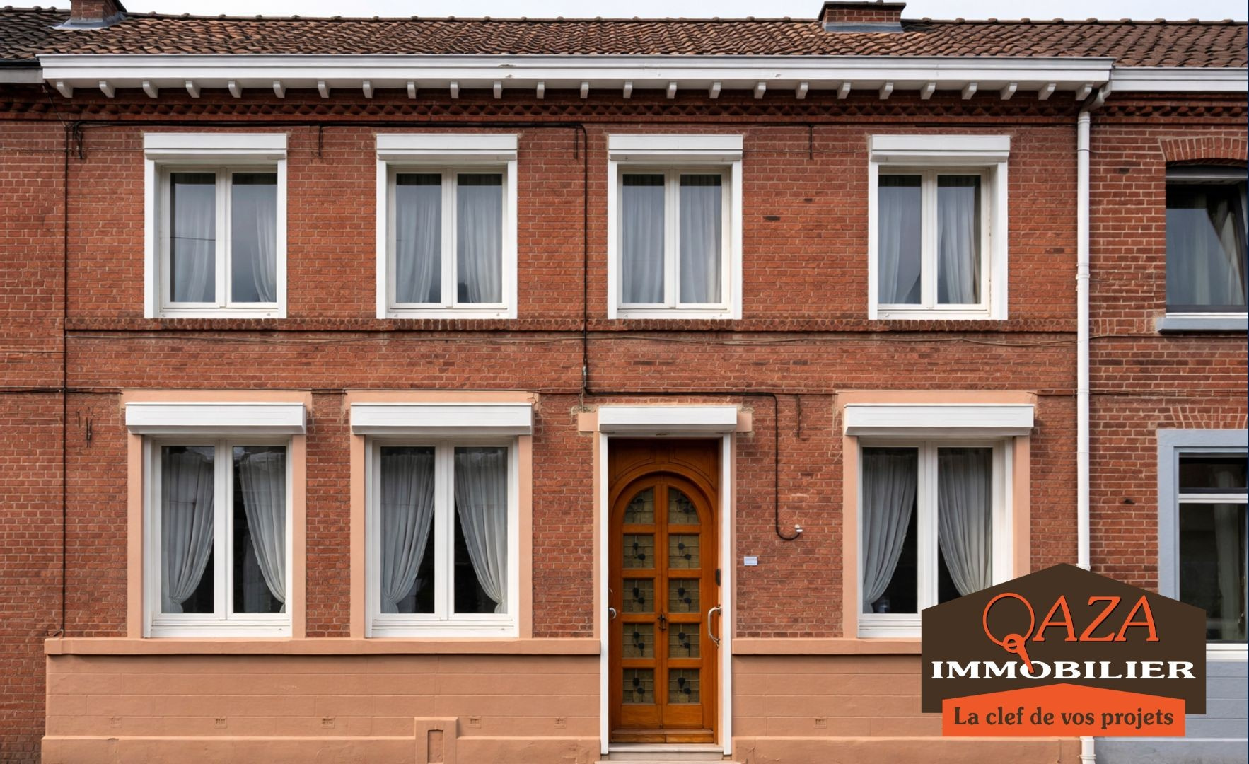 Maison ancienne double distribution au coeur du village